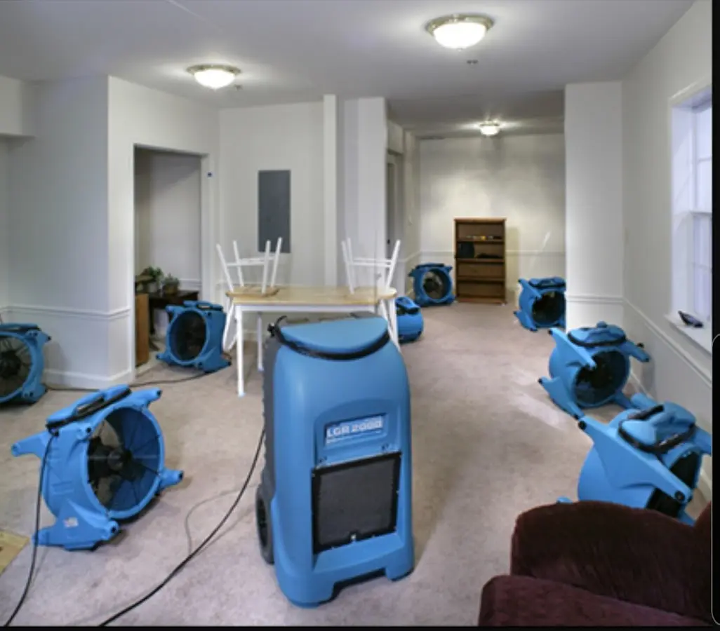 Air movers and dehumidifier setup for Water Damage Restoration in Bayville
